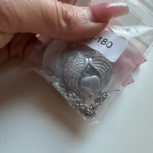 heart in a heart necklace sliver